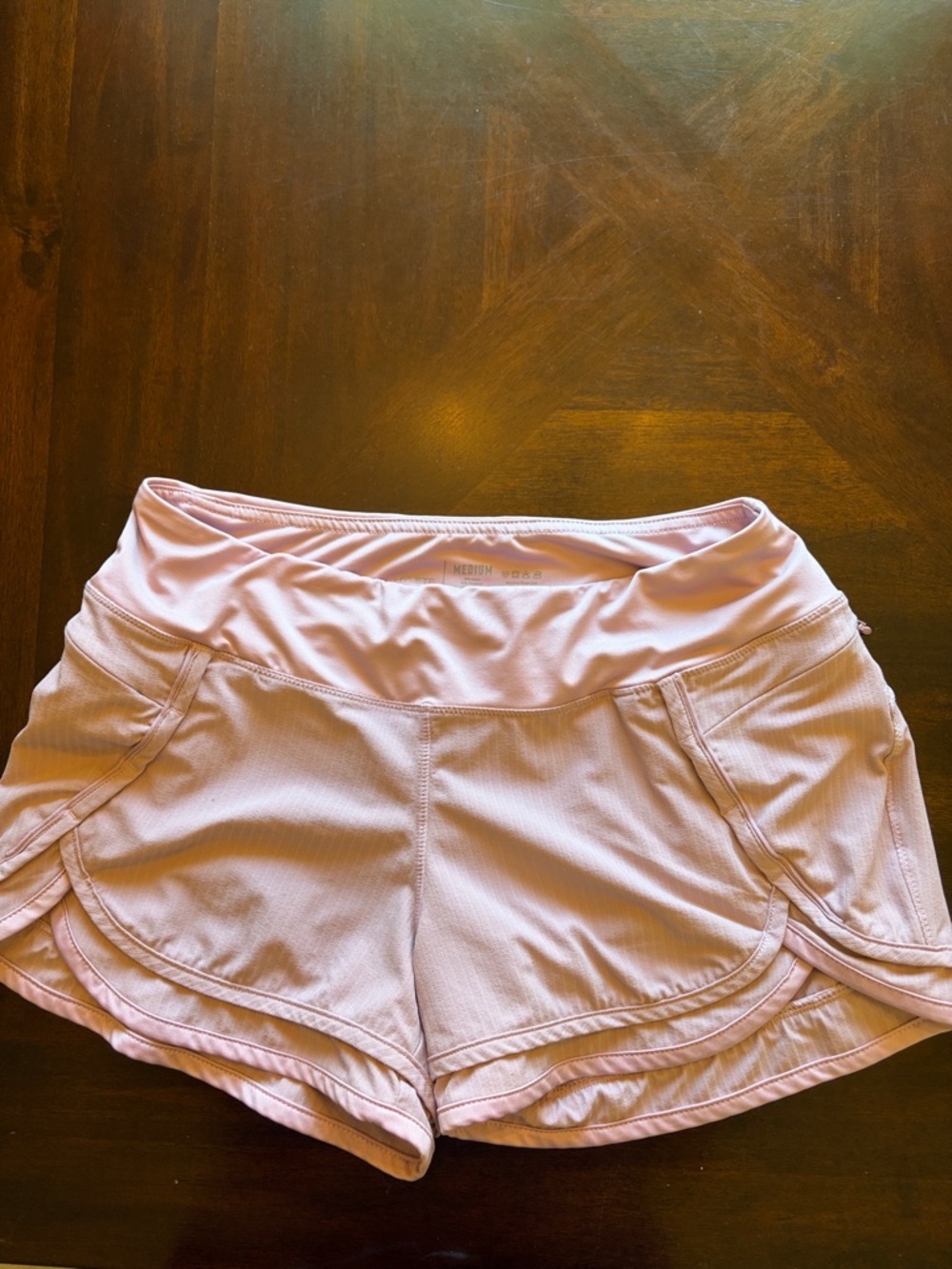 Hylete Light Pink Women’s Athletic Shorts with Layered Hem